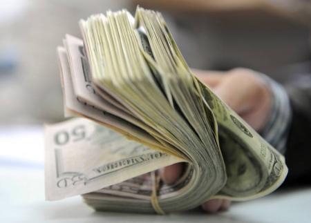 كم بلغ سعر دولار التحاويل النقدية الإلكترونية ؟