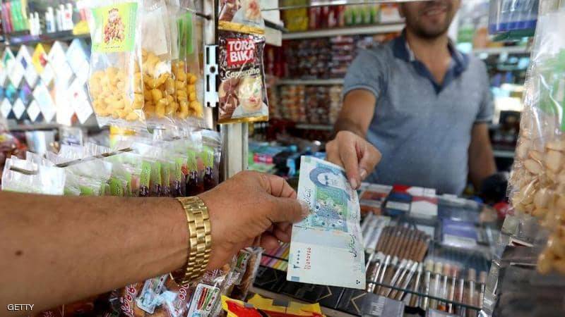 هبوط قياسي للريال الإيراني أمام الدولار