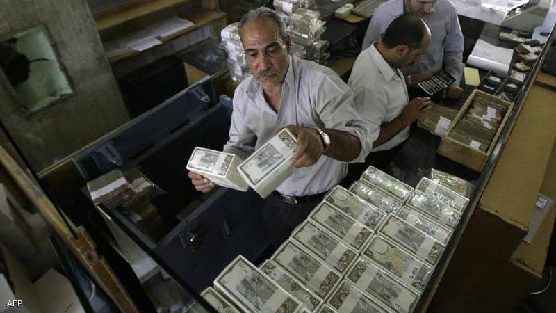 هبوط الليرة السورية إلى مستوى 