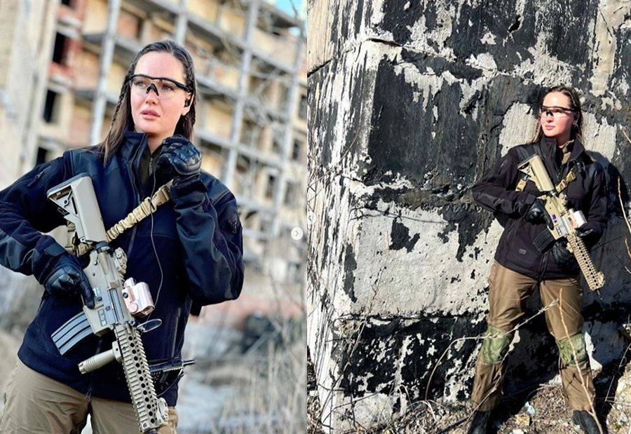 ملكة جمال أوكرانيا تحمل السلاح للدفاع عن بلدها