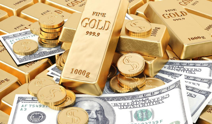 الذهب يستعيد توازنه مع إنحسار صعود الدولار