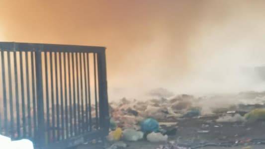 إخماد حريق نفايات