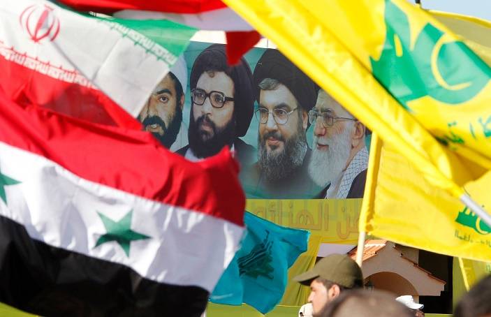 انزال أعلام إيران ورايات ميليشياتها في سوريا