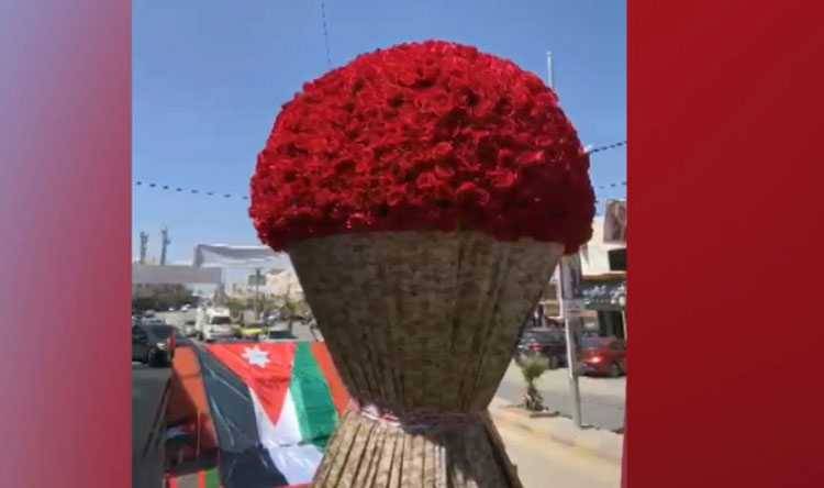 احتفالاً بالزفاف والاستقلال.. أكبر باقة ورد تجوب الأردن