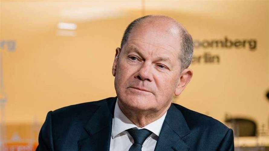 المستشار الألماني يدعو إردوغان الى برلين