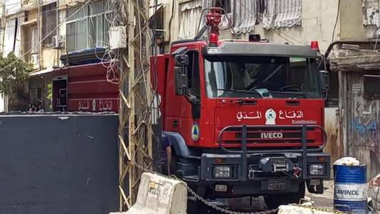 إخماد حريق في شقة