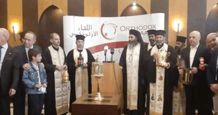 وصول الشعلة المقدسة من قبر المسيح في كنيسة القيامة إلى مطار رفيق الحريري